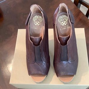 Vince Camuto leather open toe heeled booties.